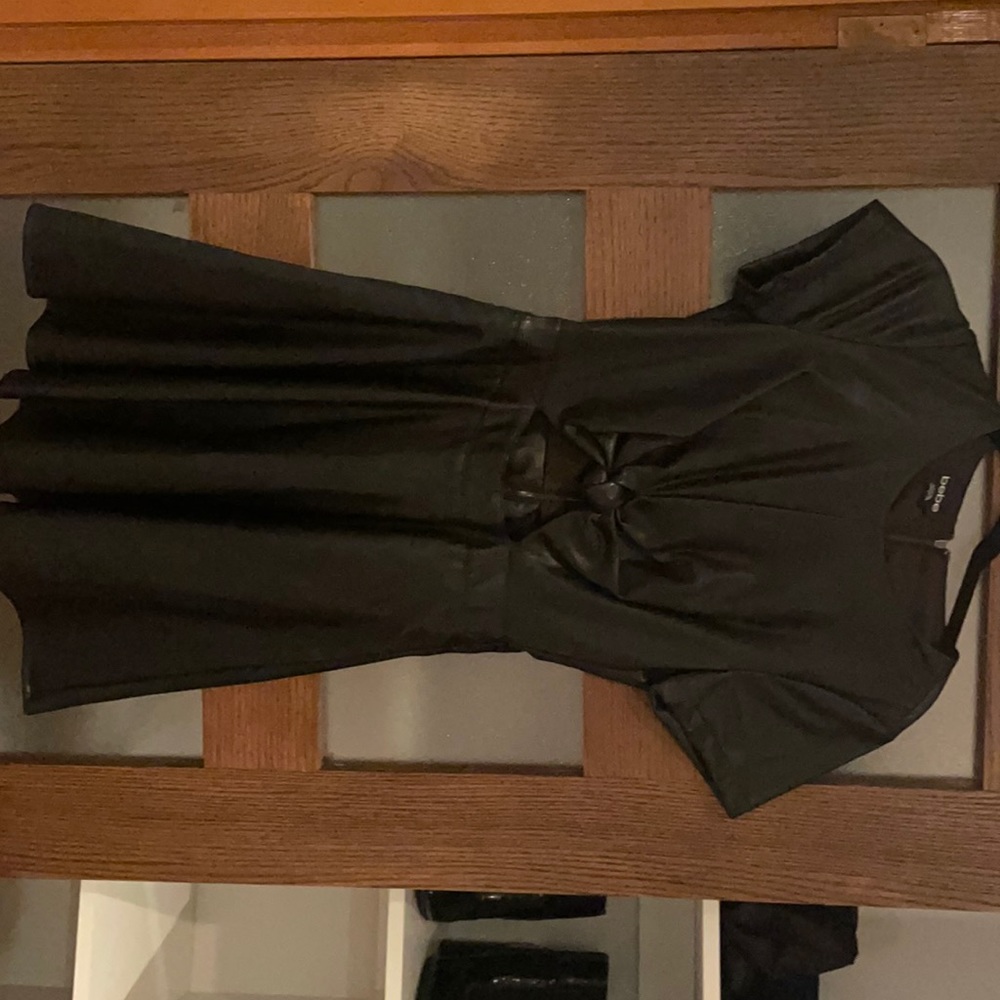 Leather short sleeve peplum mini dress